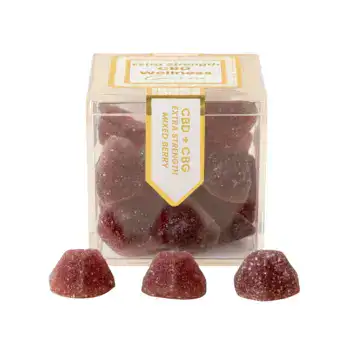 TribeTokes Extra Strength CBD Wellness Mixed Berry gummies in a clear cube box labeled CBD + CBG, with three sugar-coated berry gummies in front on a white background