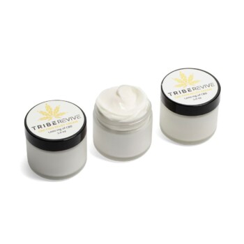 Three jars of TribeTokes TribeRevive Pain Relief Cream on a white background, the center jar open to show the whipped cream, each labeled 1,000 mg and 2.0 oz