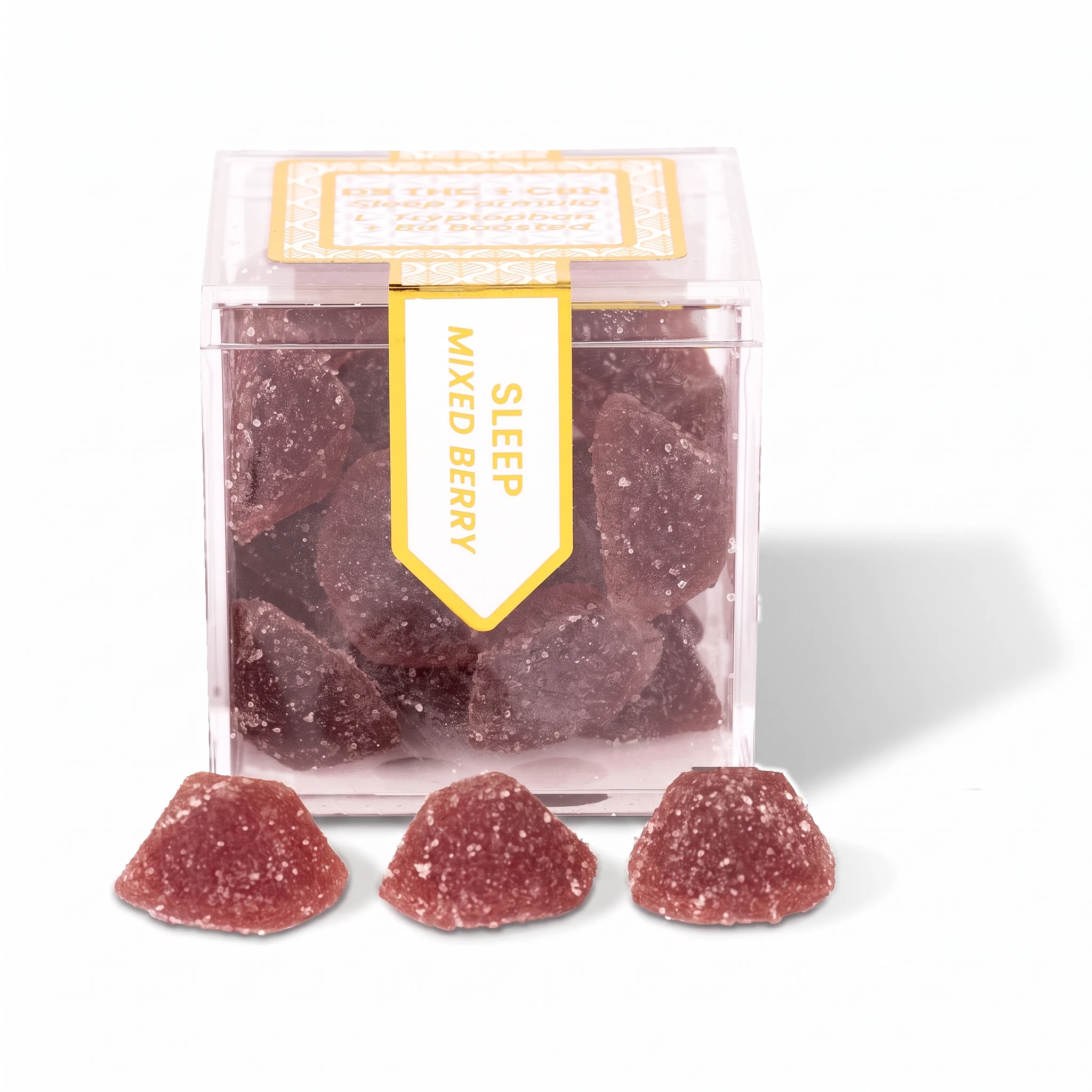 TribeTokes Sleep Mixed Berry gummies in a clear cube box with three sugar-coated berry gummies in front on a white background