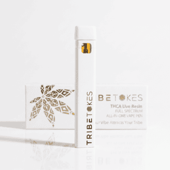 TribeTokes THCa Live Resin all-in-one disposable vape pen standing in front of its white and gold box on a white background