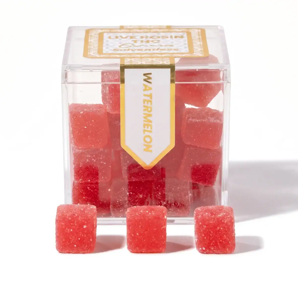 TribeTokes Live Rosin Watermelon gummies in a clear cube box with three sugar-coated red gummies in front on a white background