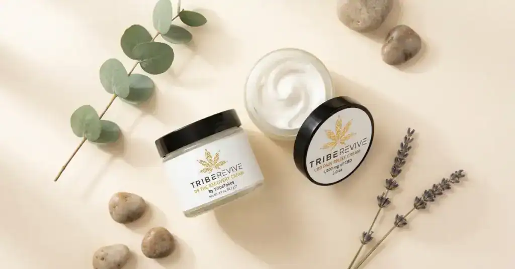 TribeRevive Delta-8 THC and CBD pain relief cream jars by TribeTokes 1,000mg topical cannabinoid creams for localized muscle, joint, and back relief