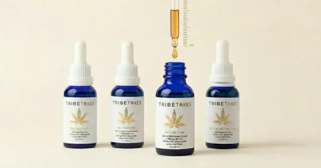 TribeTokes CBD, CBN, CBG, and Delta 8 tincture bottles with dropper and measurement scale showing cannabinoid dosage guide