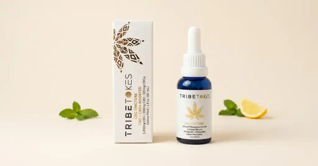 TribeTokes CBG tincture bottle on cream background, representing a complete guide to cannabigerol