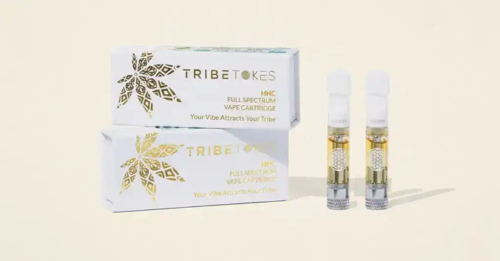 TribeTokes HHC vape cartridge on cream background