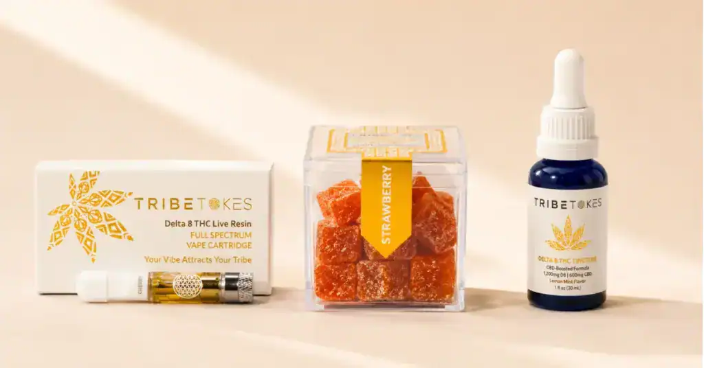 TribeTokes vape cartridge gummy box and tincture bottle side by side on a cream background representing three cannabis delivery methods with different bioavailability rates
