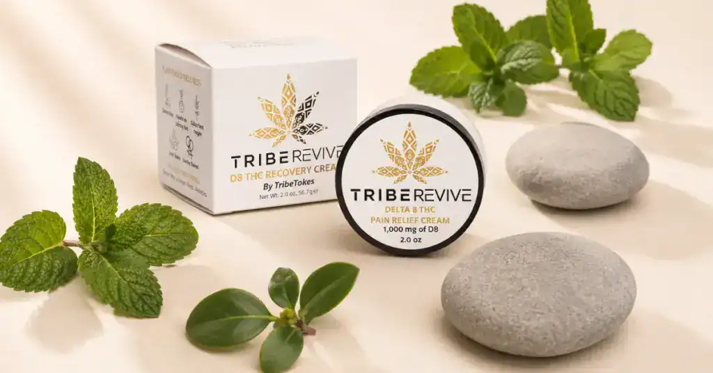 TribeRevive Delta 8 THC Pain Relief Cream tin and box with spearmint and wintergreen botanicals on a cream background representing how Delta-8 topical cream works for localized pain relief