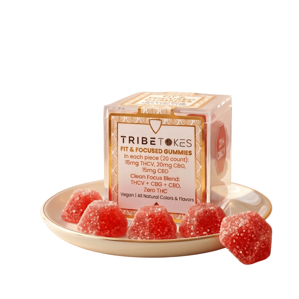 TribeTokes Fit and Focused THCV gummies box with red strawberry gummies on a plate